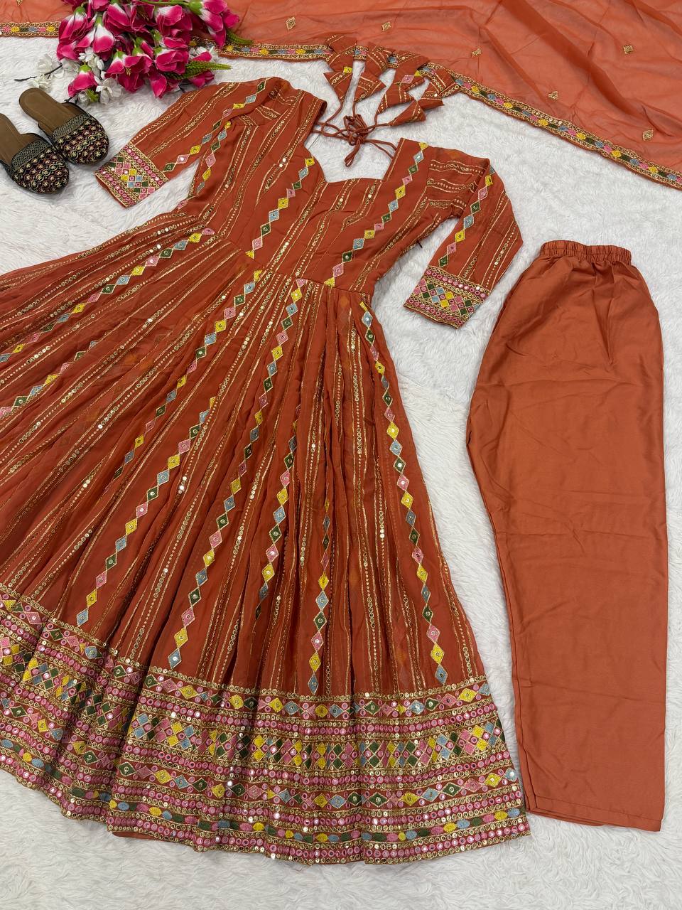 Radiant Rust Orange Flared Anarkali Suit Set Adorned with Multicolored Geometric Embroidery and Dazzling Mirror Work Detailing